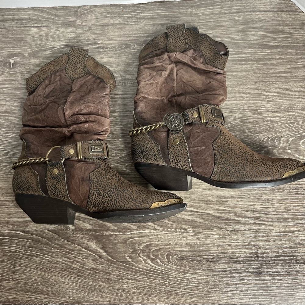 Stylish Brown Heeled Boots with Chain Accent